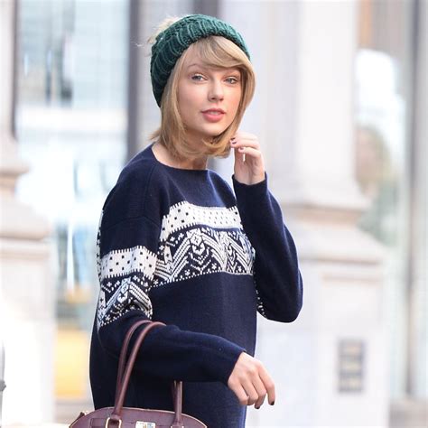Taylor got into the festive dressing as well, wearing a Santa hat with 87, Kelce's number, on the brim. She also kept to her recent style of a mini skirt—this one was a plaid number from Hill ...